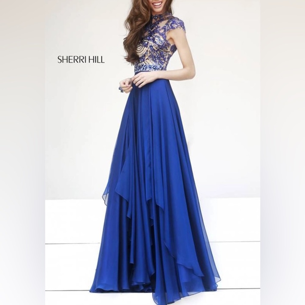 Blue formal evening gown. Satin with beads on top. Cut out back. Size 6.
